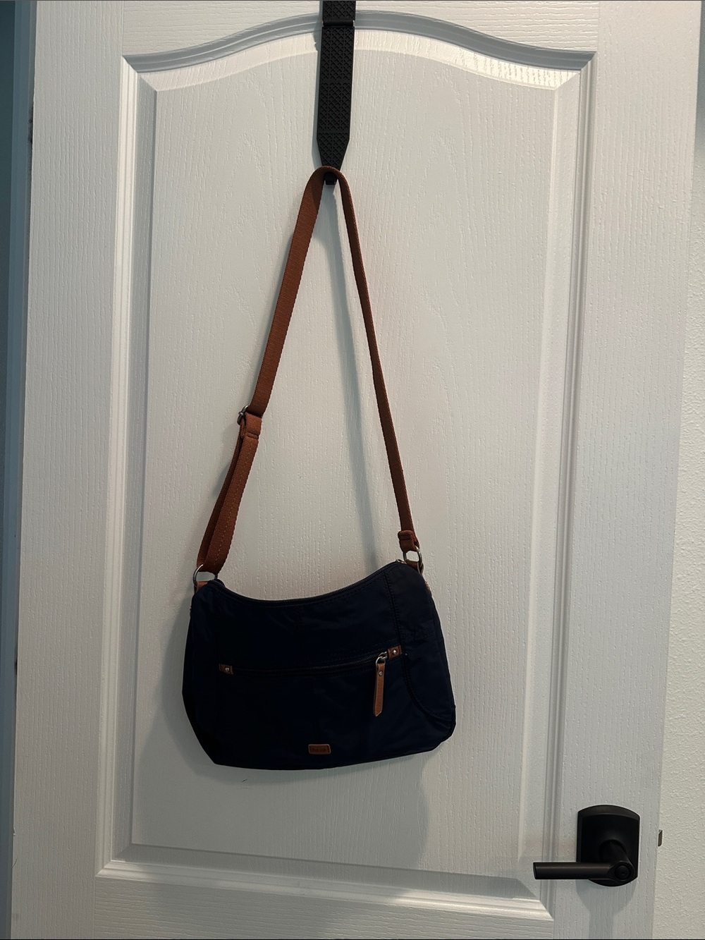 The Sak Navy Crossbody with Brown Adjustable Strap
